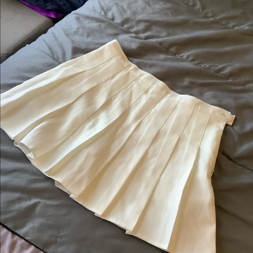 White pleated skirt
